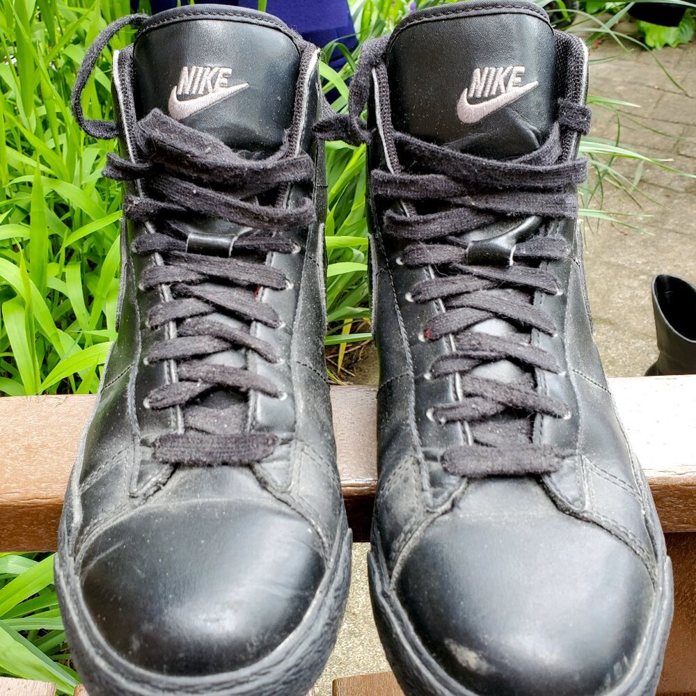 All black Nike mid tops